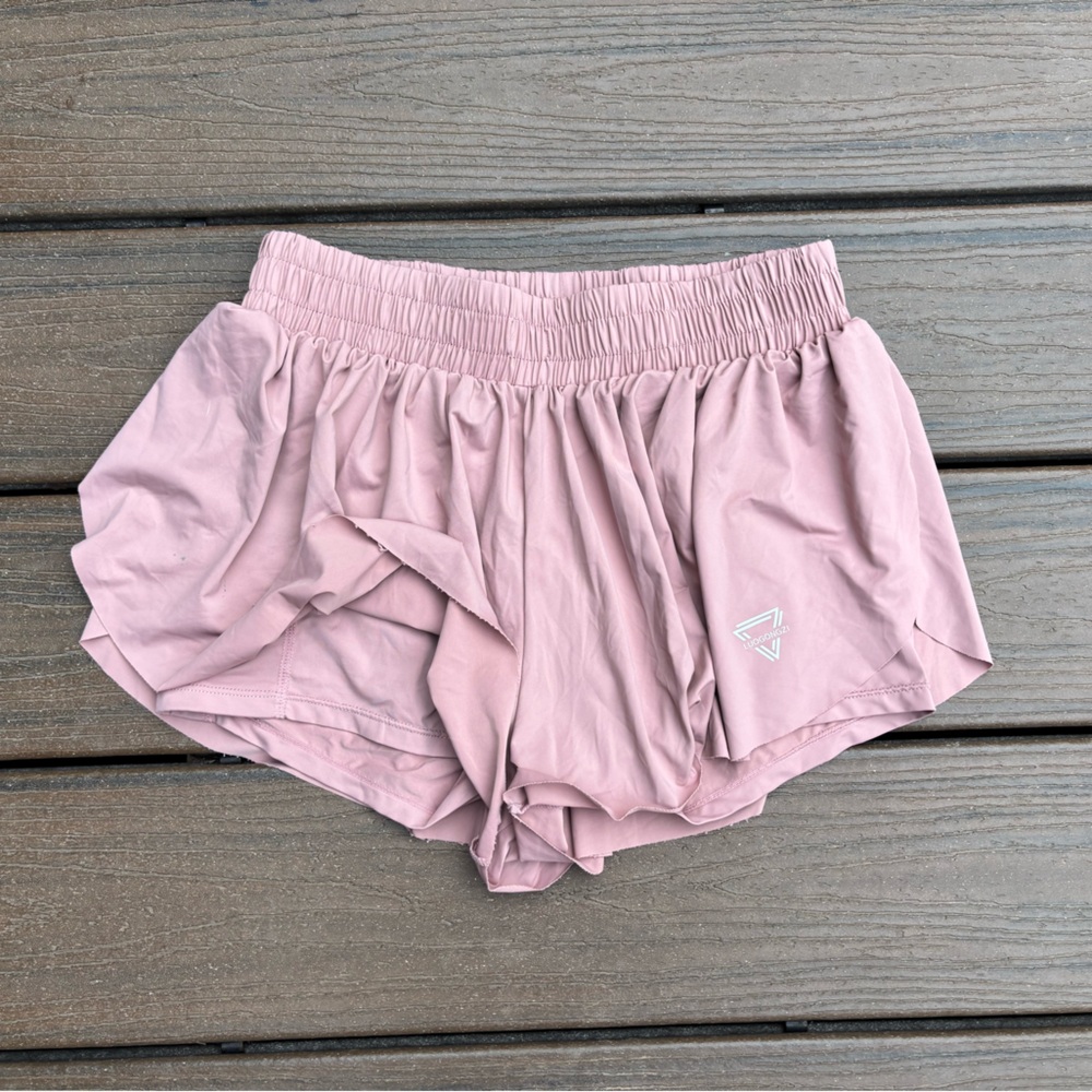 Pale pink butterfly athletic shorts w/built in spandex.